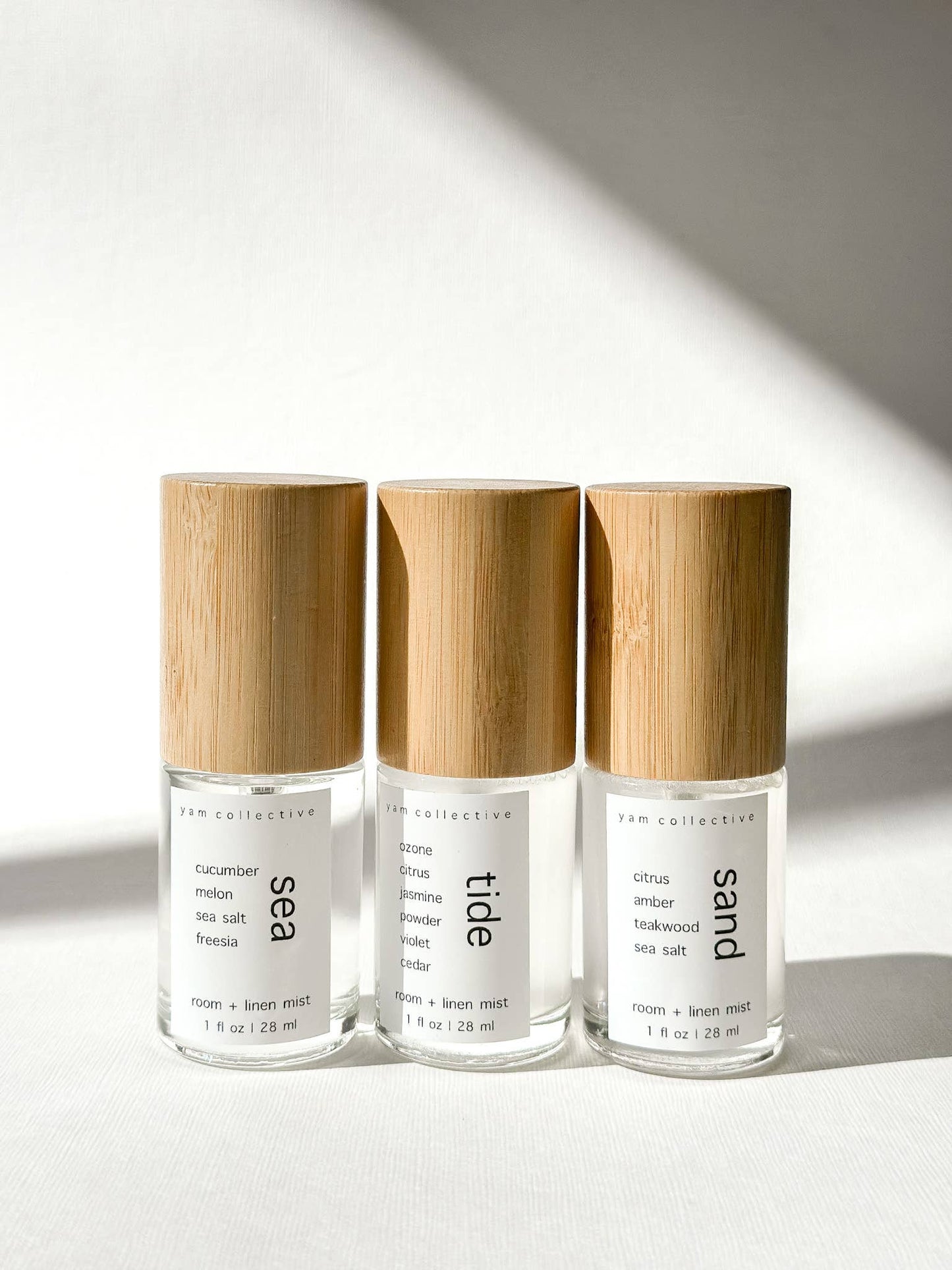 Sand- 1 oz citrus, amber, teakwood, sea room + linen mist